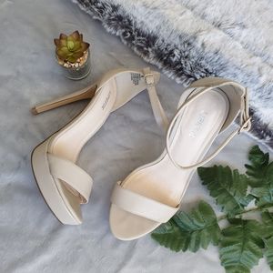 Nude platform heels.